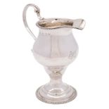 A George III silver pedestal cream jug, maker's mark worn probably Nathaniel Appleton & Ann Smith,