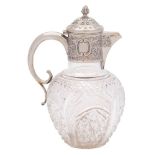 A Victorian cut glass and silver mounted claret jug, maker Thomas Latham & Ernest Morton,