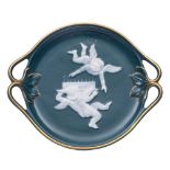 A small pate-sur-pate teal-blue ground dish: with foliate branch handles,