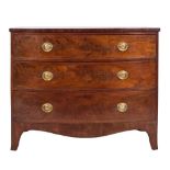 An early 19th Century mahogany bow-fronted chest:, containing three long drawers,