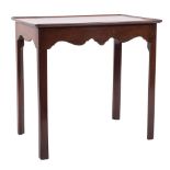 A George III mahogany rectangular silver table:, with a moulded top and shaped apron sides,