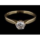 A 14ct gold and diamond solitaire ring: the round, brilliant-cut diamond estimated to weigh 0.