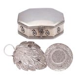 A silver filigree leaf-shaped dish: 15cm. long, an Indo-Persian silver dish, 10cm.