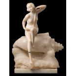 An Art Deco period alabaster lamp/sculpture: of a female nude holding a string of beads and seated