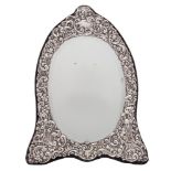 An Elizabeth II silver framed mirror, maker Keyford Frames Ltd, London, 1990: of arched outline,