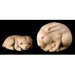 A Japanese carved ivory netsuke: of a rabbit or hare eating lettuce, signed, 4cm.