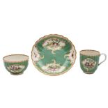 A First Period Worcester trio: of ribbed form decorated with bunches of fruit, foliage,