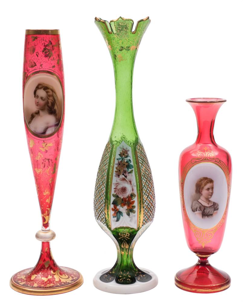 Three Bohemian overlay glass vases: two bearing oval female portraits reserved on a gilt