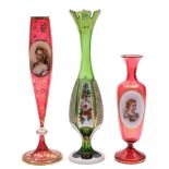 Three Bohemian overlay glass vases: two bearing oval female portraits reserved on a gilt