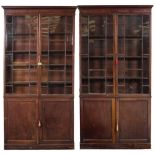 A pair of 19th Century mahogany bookcases:, the upper parts each with a moulded cornice,