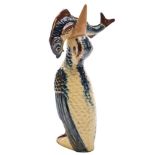 An Alexander Lauder (Barnstaple) pottery Bittern vase: modelled standing with a fish in its mouth