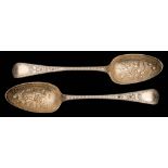 A matched pair of Victorian Old English pattern silver berry spoons maker's marks worn London,
