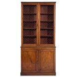 An early 19th century mahogany bookcase,