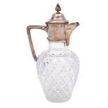 An Edward VII clear glass and silver mounted claret jug, maker Mappin & Webb, London,