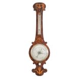 An Edwardian rosewood wheel barometer with inlaid decoration: the eight-inch round silverted dial