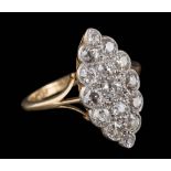 A diamond marquise-shaped cluster ring: pave-set with round old,