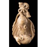 A Japanese carved ivory netsuke: of two rats standing on the back of a mirror, unsigned, 7cm. long.