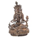 A Sino-Tibetan bronze figure of Buddha: holding two lotus flowers,
