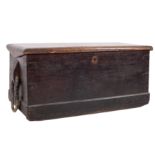 A 19th century sailors teak chest: of rectangular tapered form having a hinged moulded top and