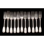 A collection of eleven silver Fiddle pattern dessert forks,