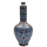 A group of four pieces of Turkish Kutahya pottery: including two long-necked jars,