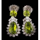A pair of peridot and diamond drop earrings: each with a pear-shaped peridot, approximately 14.