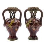 A pair of Portugese Palissy Ware vases: attributed to Manuel Mafra each of baluster form the