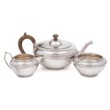 A George V silver three piece tea service, maker Charles & Richard Comyns, London,