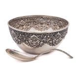 An Eastern silver bowl and ladle,