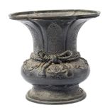 A Chinese bronze vase: of squat baluster form with lobed flared rim,