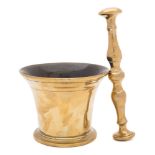 A late 18th Century bronze pestle and mortar: of traditional design, the mortar 12cm.