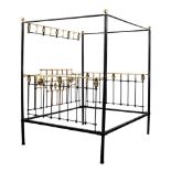 A late 19th/early 20th Century brass and iron four poster bed:,