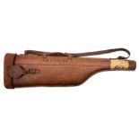 A brown leather leg o' mutton gun case: with personalised inscription, A.W. Stericker, D.C.L.I., 80.