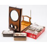 An early 20th century graphoscope and a collection of stereoscopic cards:,