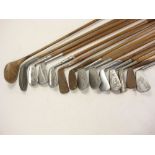 A group of early 20th century golf clubs:, including an Alex Aitken Super mashie,