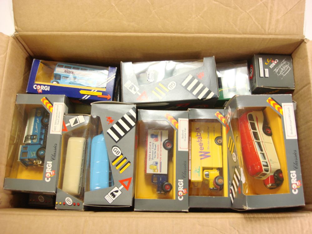 A boxed group of Corgi buses and commercial vehicles:,