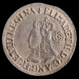 Coins. A 1568 Elizabeth I sixpence:.