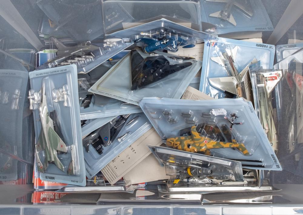 A group of diecast combat aircraft and helicopters etc:, all in original blister packs,