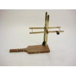 A beech and brass line winder/dryer by Farlow & Co., London:.