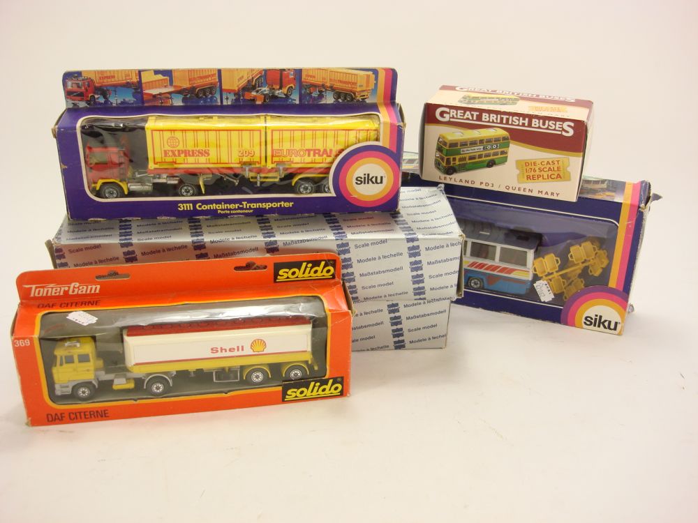 Conrad, Siku and others, a boxed group of buses and commercial vehicles:,