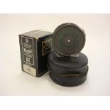 A Hardy Perfect 3 3/8 inch fly reel:, black handle, agate line guide and engine turned tensioner,