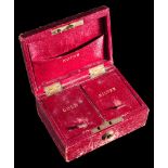 A late 19th/early 20th century red leather money box:,