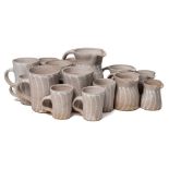 *Frances Pollard (Contemporary) a group of domestic stonewares: comprising five graduating jugs and