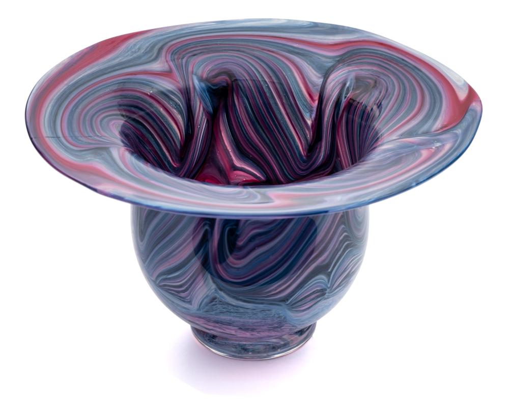 An art glass bowl: of deep 'U' shaped form with flaring rim, the red,