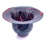 An art glass bowl: of deep 'U' shaped form with flaring rim, the red,