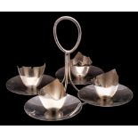 A silver plated four-division egg cup stand,