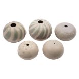 *Val Barry (1937-2018) five stoneware 'compressed spheres': two decorated with wax resist radial