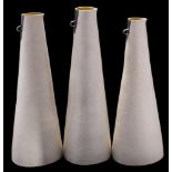 *Susan Disley (Contemporary) three stoneware vessels: of slender elongated jug-like form with small