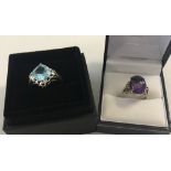 2 boxed ladies silver stone set dress rings.