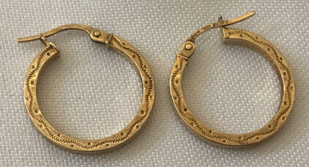 A pair of 9ct gold hoop earrings.